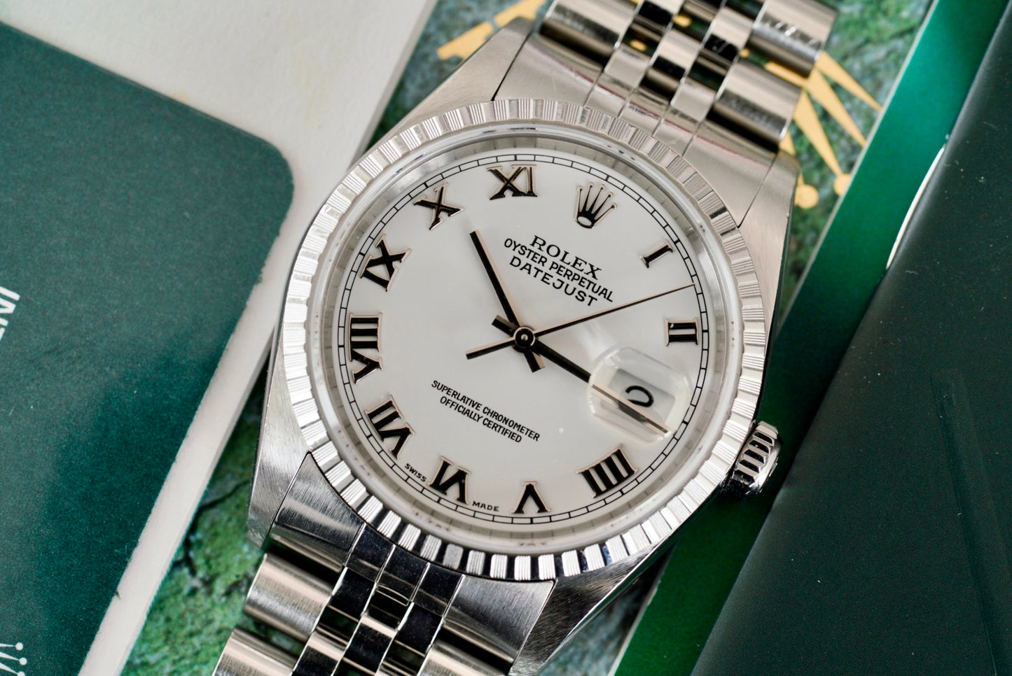 (16220) 2004 Rolex Datejust ‘White Roman’ Engine-Turned Bezel 36mm