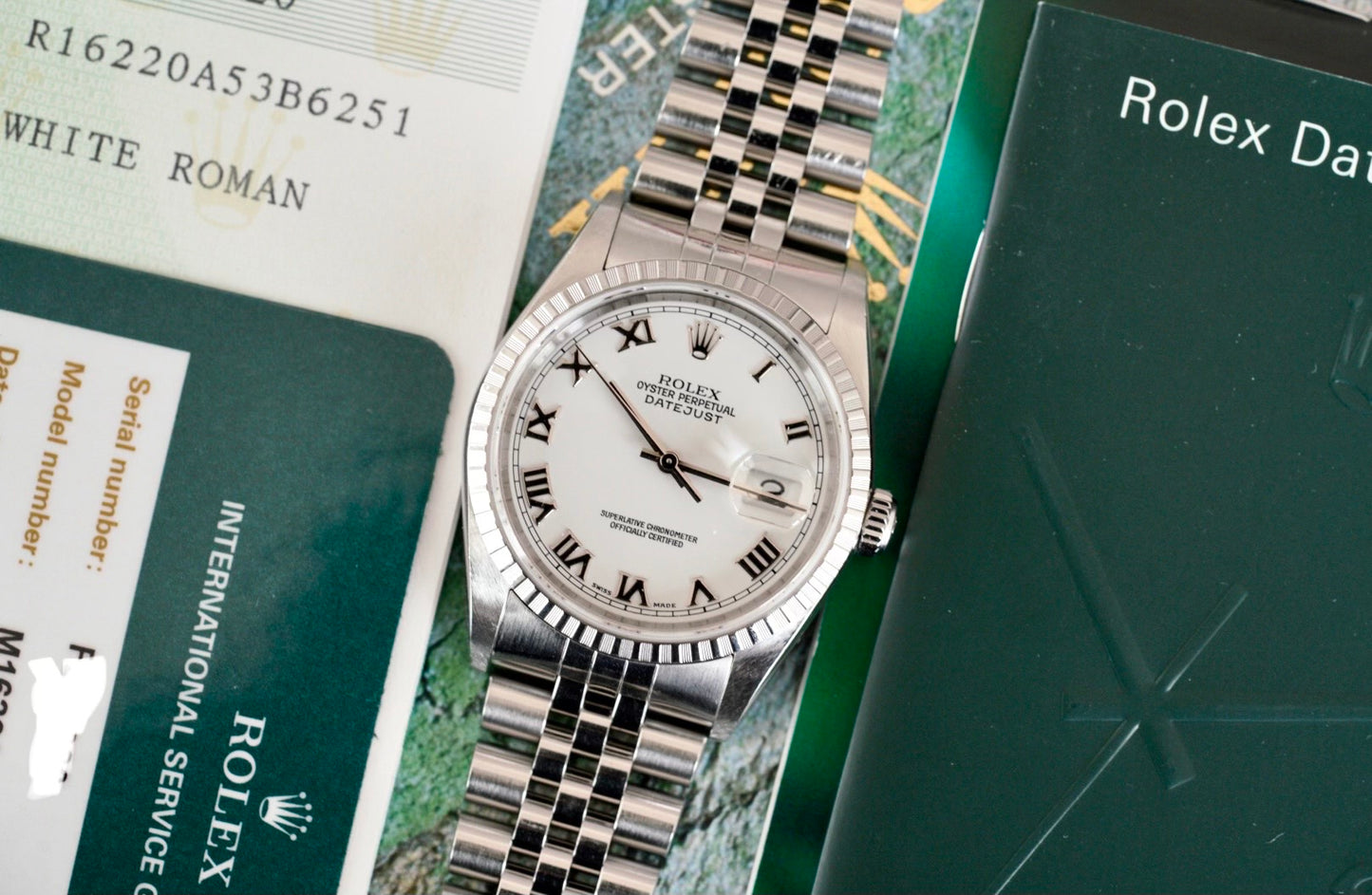 (16220) 2004 Rolex Datejust ‘White Roman’ Engine-Turned Bezel 36mm